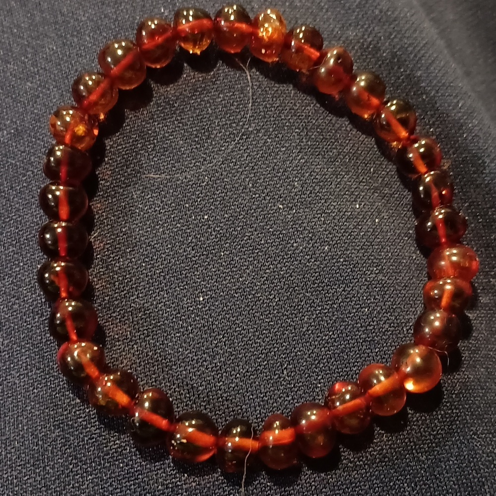 Unisex 7.5 inch Cognac Colored Genuine Baltic Amber stretch bead bracelet